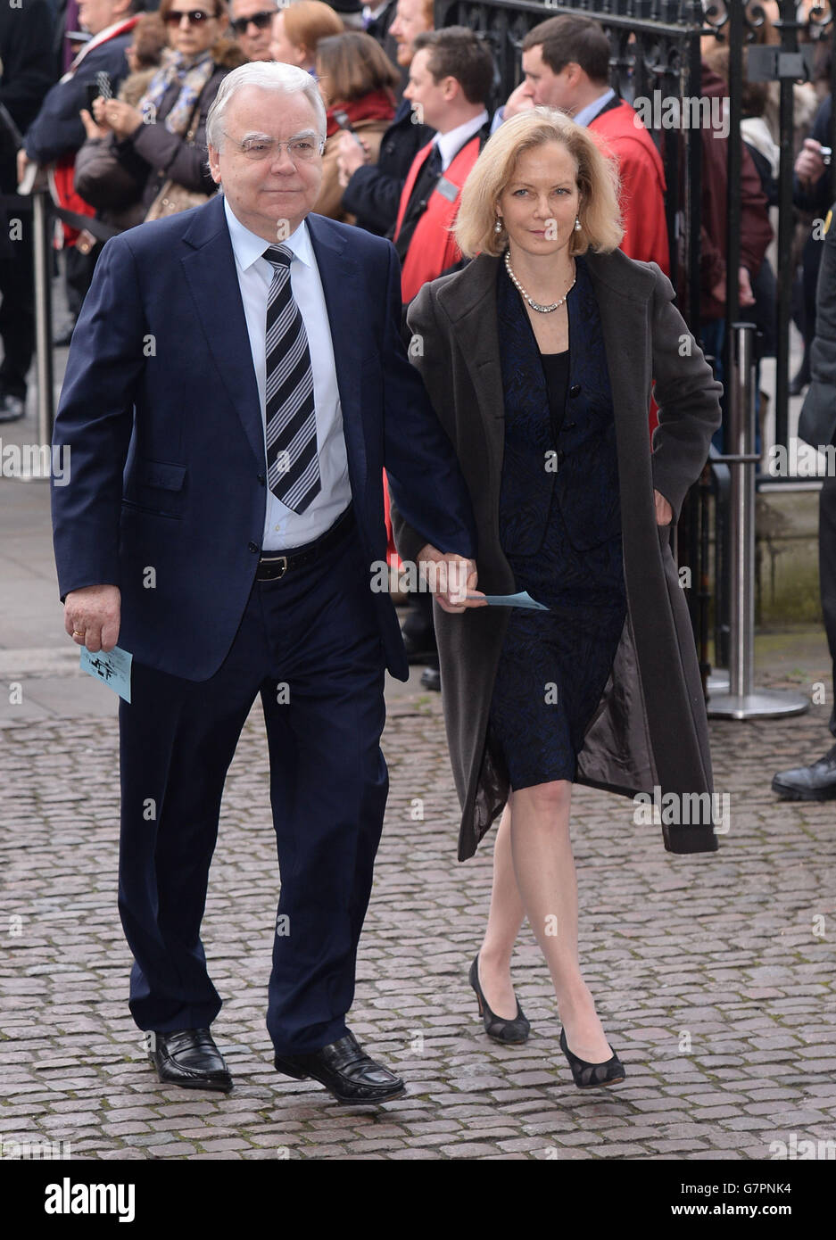 Bill Kenwright and Jenny Seagrove arrive at Westminster Abbey in London for the memorial service of Lord Richard Attenborough, who died last year. Stock Photo
