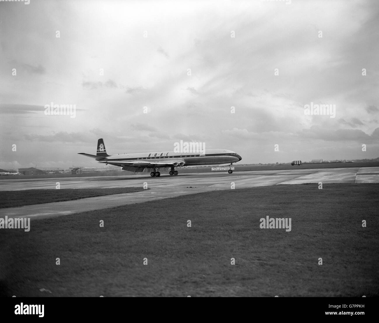 BOAC's Comet 4 jetliner Delta Bravo touches down at London Airport after the inaugural west-east flight of the first commercial jetliner service across the Atlantic. The plane had set up a new record for civilian aircraft by flying the 3,560 miles from New York in six hours seven minutes at an average speed of 580 miles an hour. Her total time in the air was six hours, 12 minutes. Stock Photo