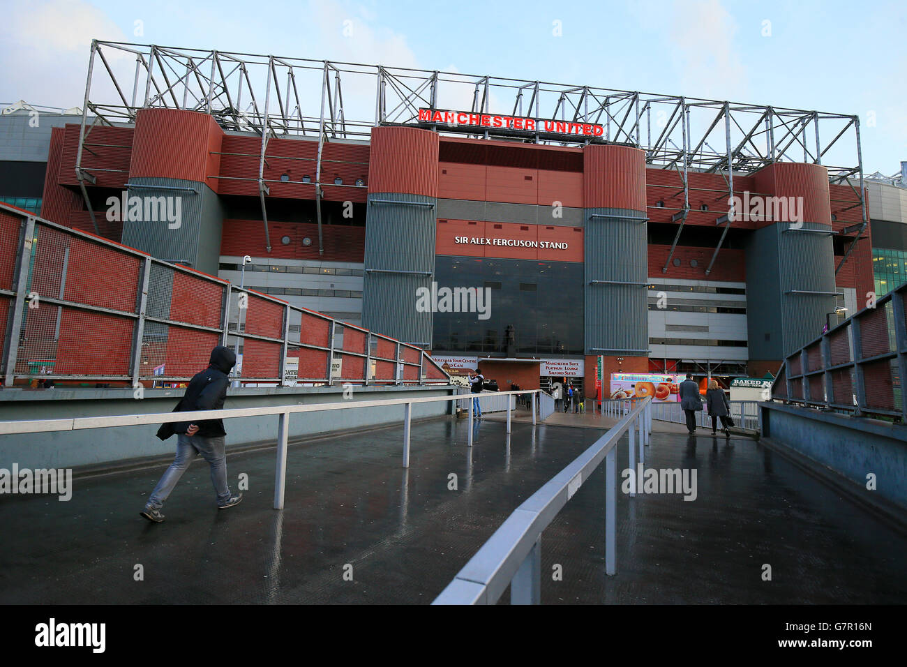 Fans arriving at the alex ferguson stand at old trafford hi-res stock ...