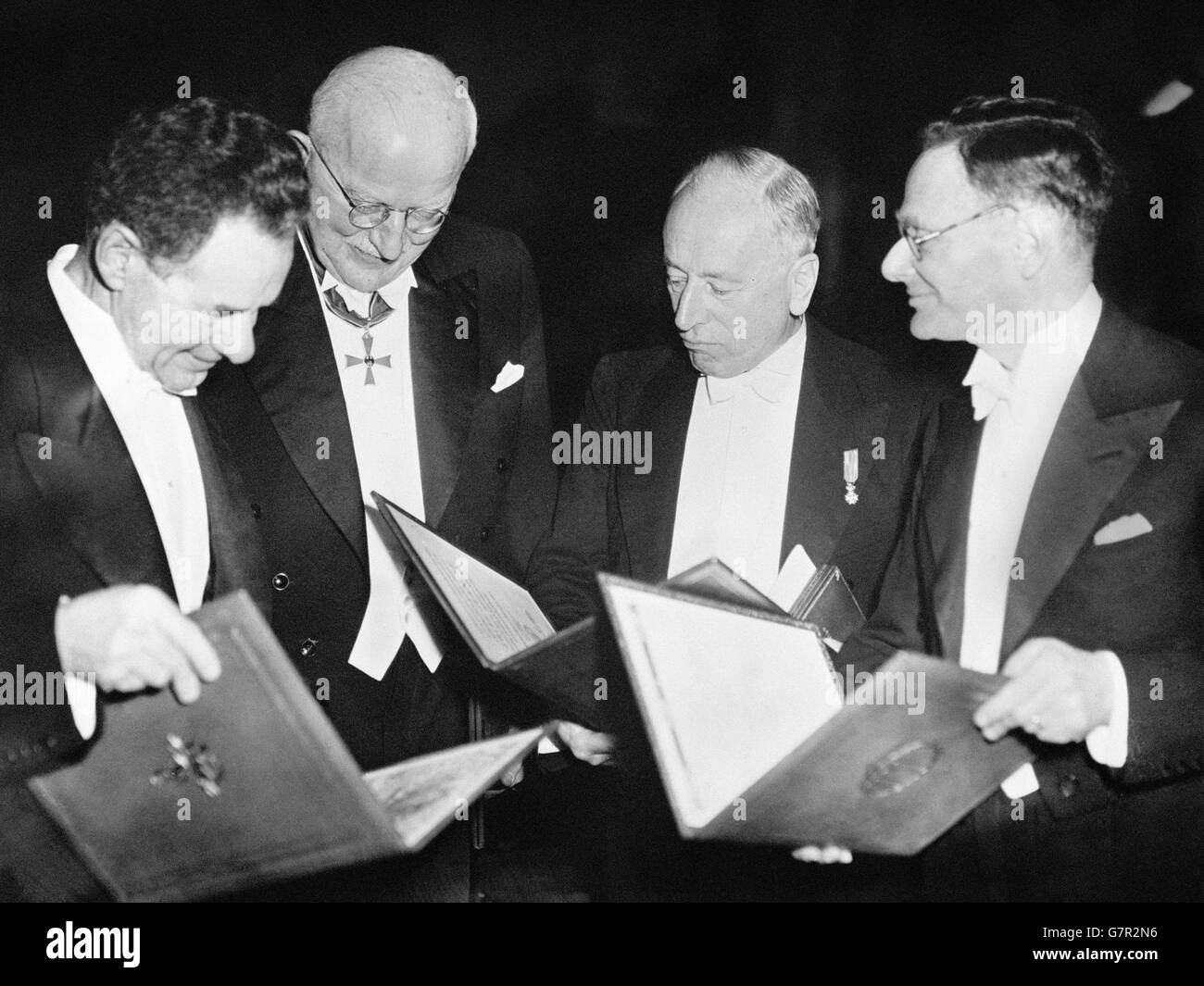 Some of the Nobel Prize winners of 1952 pictured with their diplomas after the presentations in Stockholm. (l-r) Fritz Lipman, USA (Medicine), Herman Staudinger, Germany (Chemistry), Fritz Zernike, Holland (Physics) and Hans Adolf Krebs, Great Britain (Medicine). Sir Winston Churchill (not pictured) was awarded the prize for literature and Lady Churchill received it on behalf from the King of Sweden.archive-pa38954-2 Stock Photo