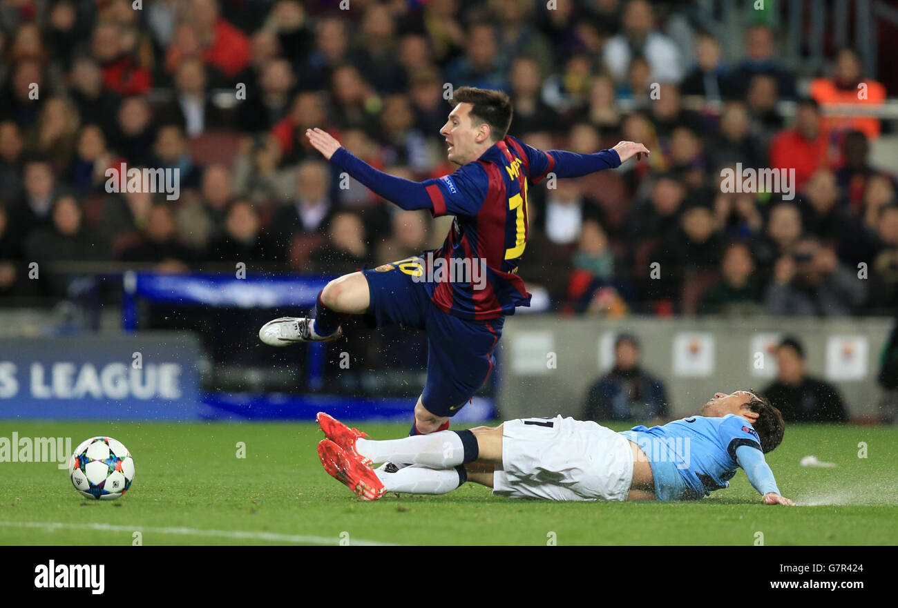 Barcelona's Lionel Messi is fouled by Manchester City's David Silva (right  Stock Photo - Alamy