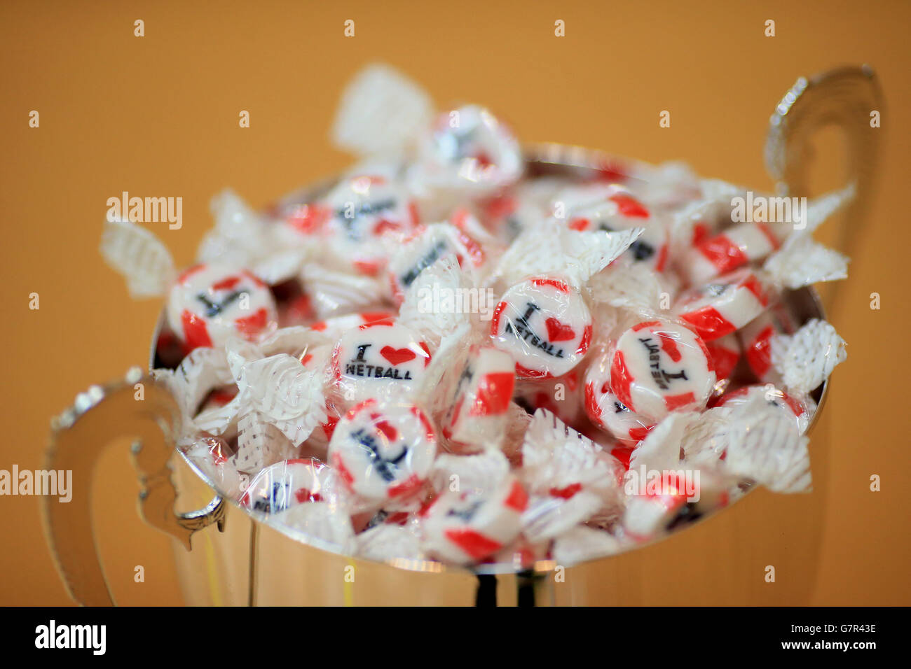 Sweets fill the trophy during the Netball in the City event at the Copper Box Arena, London Stock Photo