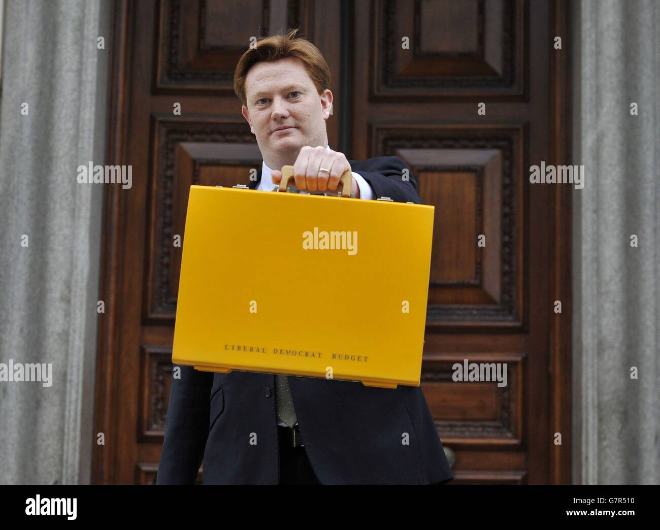 Danny Alexander Chief Secretary to the Treasury Danny Alexander holds his yellow budget ...