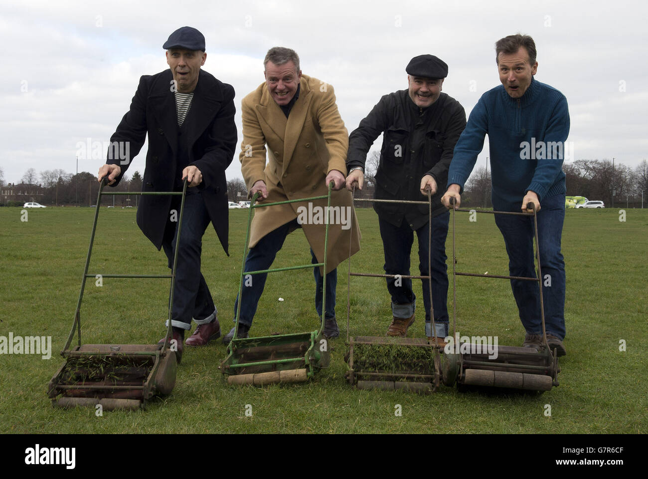 (Left - right) Mark Bedford, Graham 'Suggs' McPherson Chris Foreman and Daniel Woodgate of Madness on Blackheath Common as the group promote their OnBlackheath Festival headline performance on Sunday September 13. Stock Photo