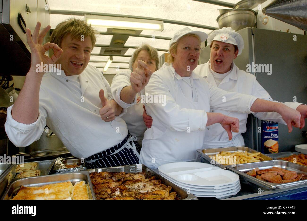 Jamie Oliver serves dinners to children - Leicester Square Stock Photo