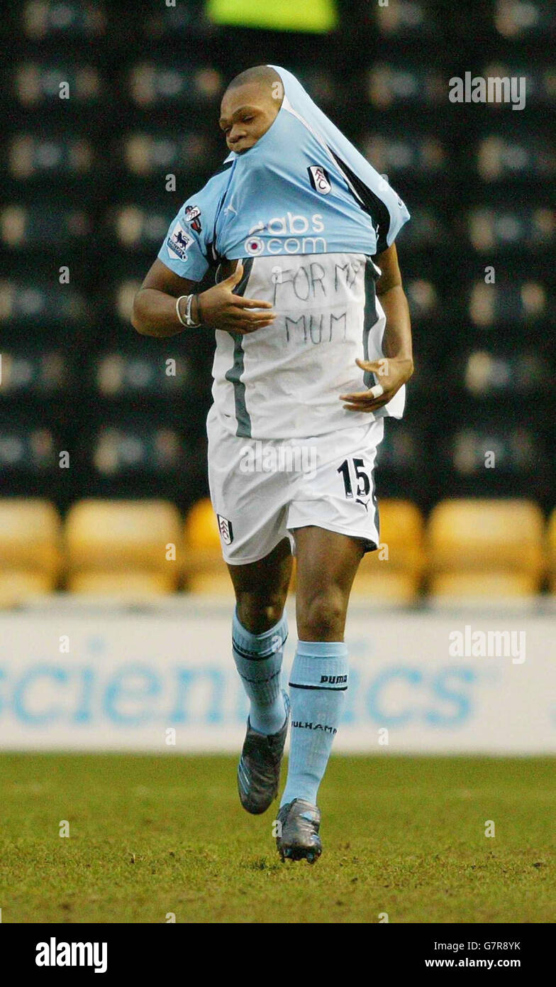 Fulham's Collins John celebrates with a message for his mum after scoring his goal Stock Photo