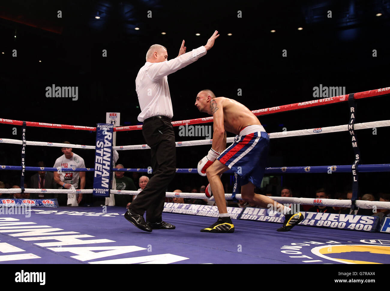 The fight is stopped between Derry Mathews and Gyorgy Mezei Jnr in their Lightweight Contest at the Echo Arena, Liverpool. Stock Photo