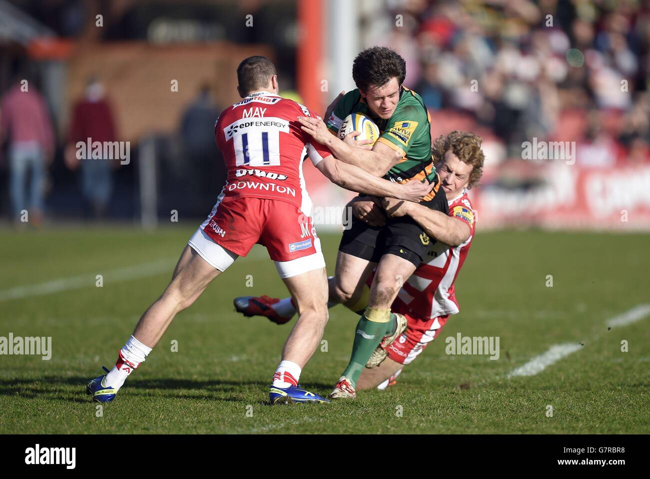 Northampton Saints' Jamie Elliott is tackled by Gloucester Rugby's ...