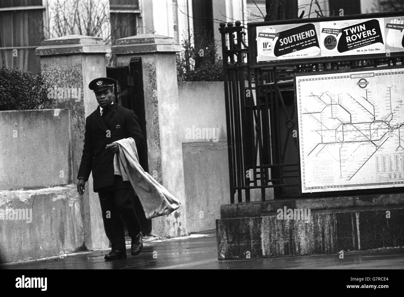 Black postman hi-res stock photography and images - Alamy