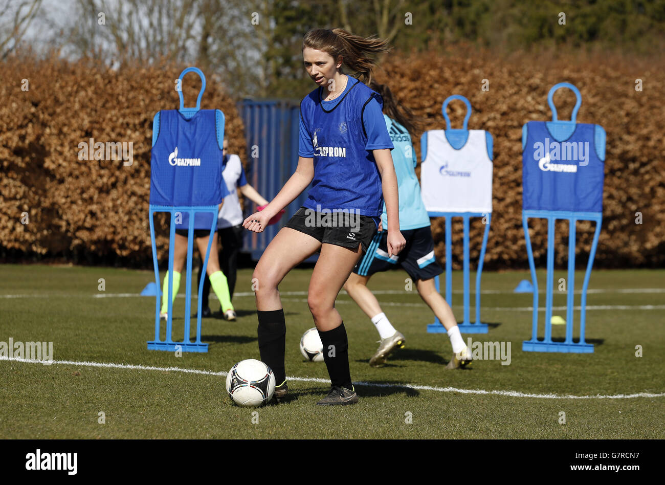 Chelsea Ladies FC welcome Kingston University LFC for an exclusive training session courtesy of club partners Gazprom to celebrate International Women's Day at Cobham Training Centre. Stock Photo