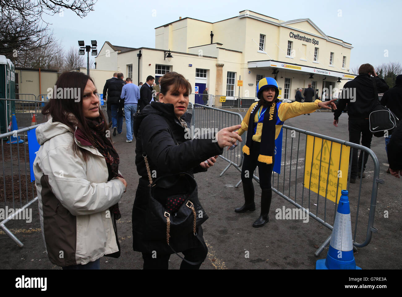 William Hill outside Cheltenham Spa train station directing racegoers to Cheltenham races, on St