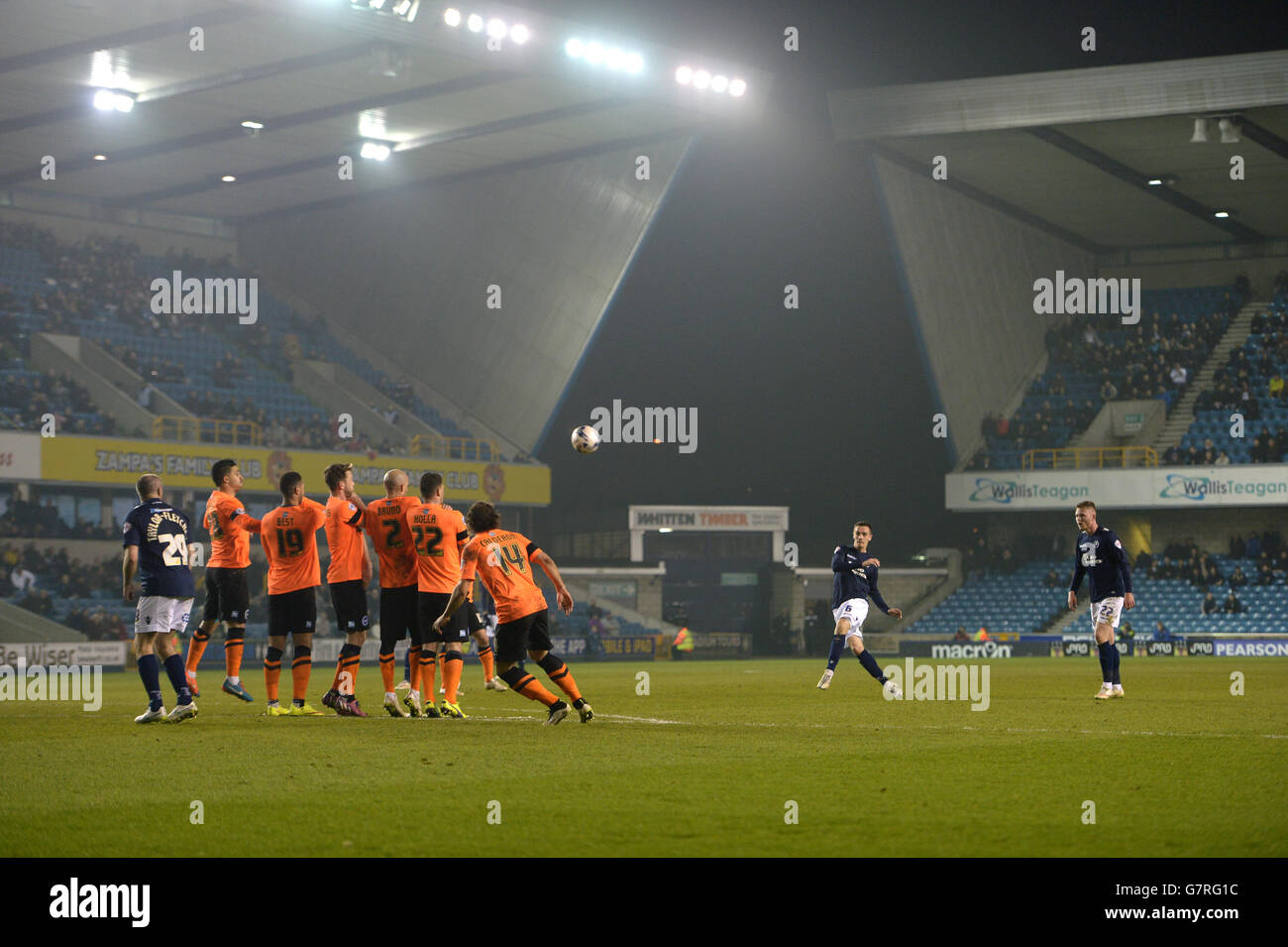 Millwall's Shaun Williams strikes a freekick over the Brighton and