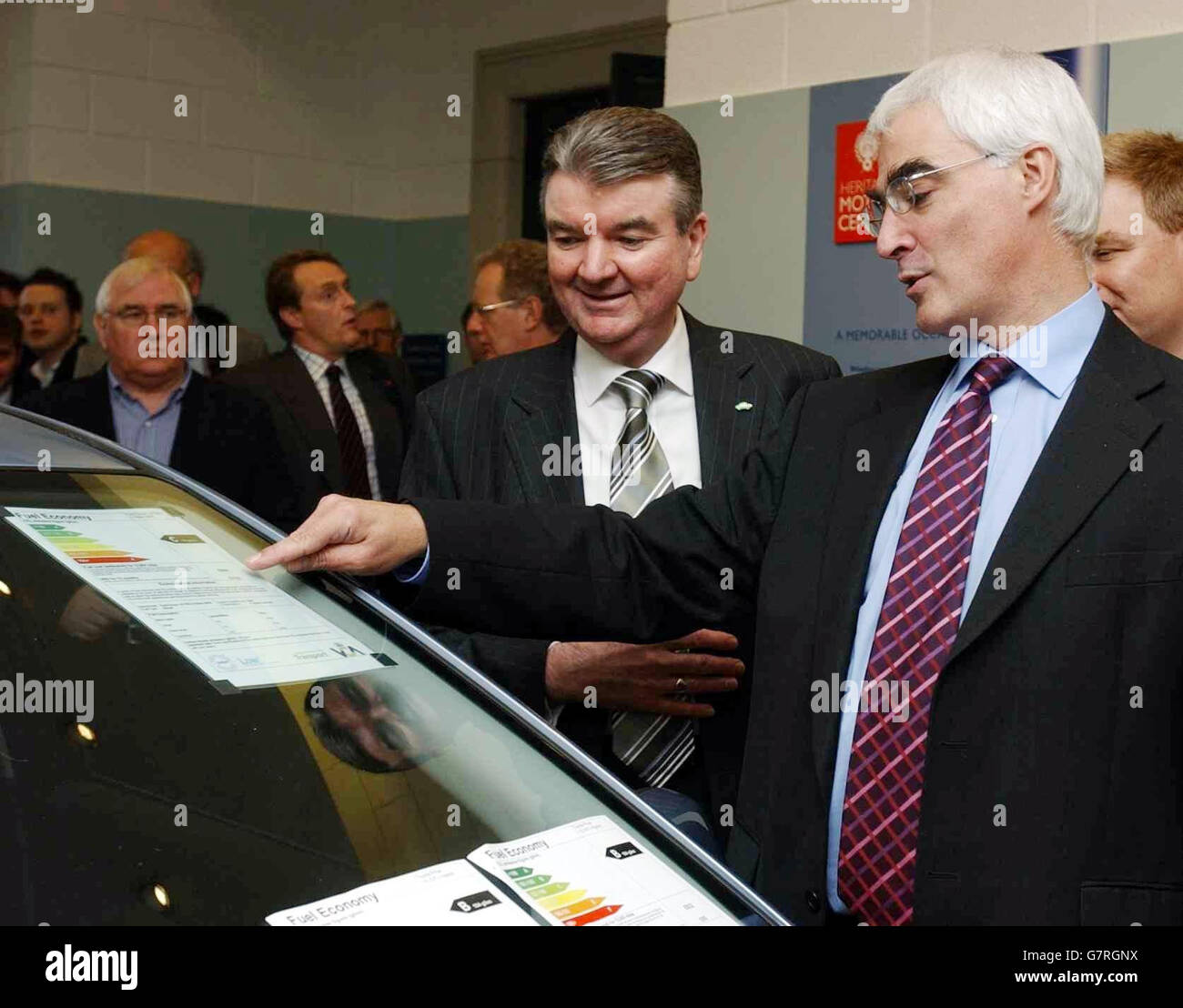 Transport Minister Alistair Darling looks at new Low CVP labels with Graham Smith, Chairman for Low CVP. Stock Photo