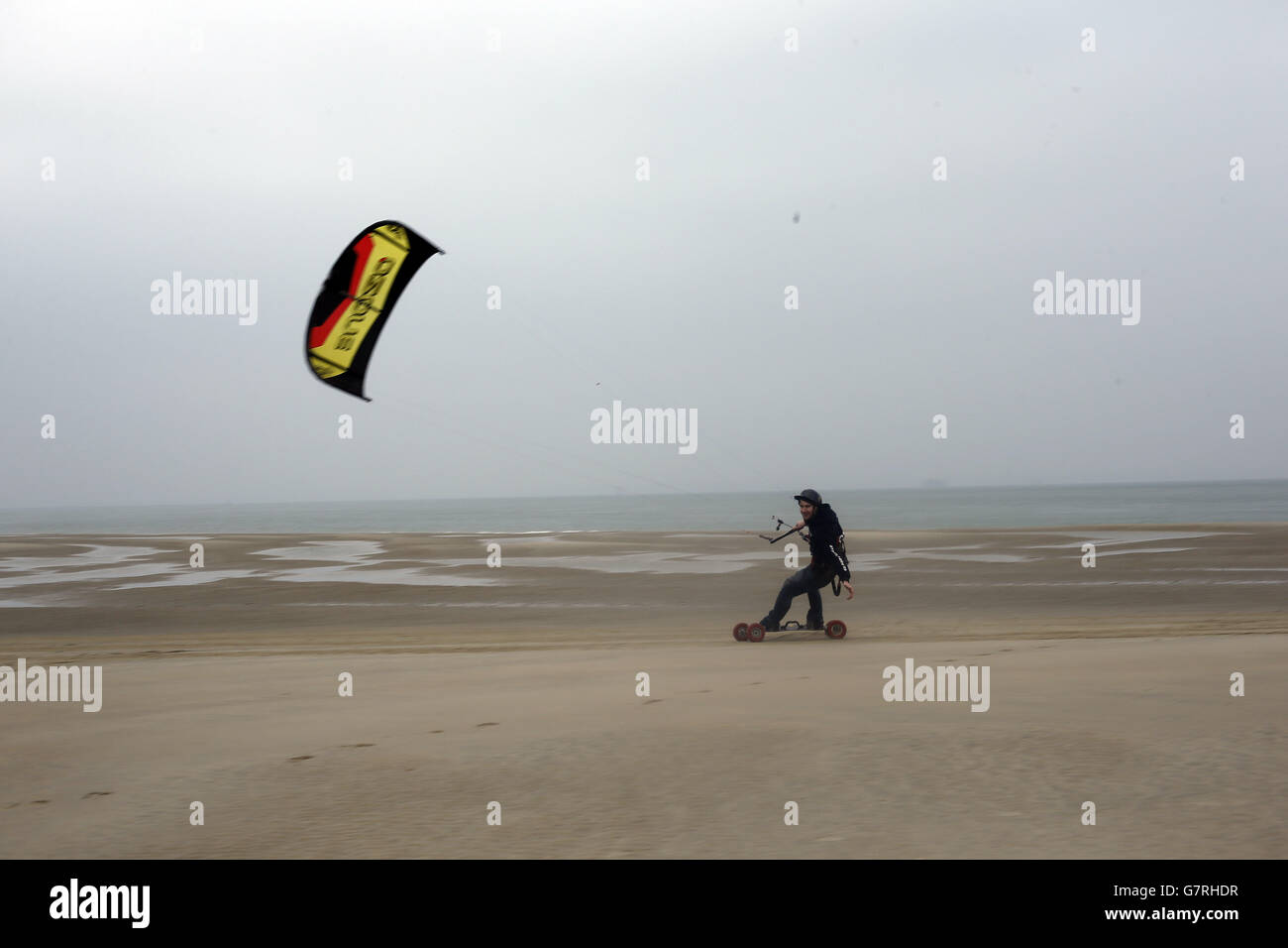 Kite boarder Steve Smith who reached 36.1mph on a beach in Hayling Island, Hampshire, which subject to verification from Datron technology and then from Guinness World Records is a brand new world record for the fastest speed on a kite board. Stock Photo