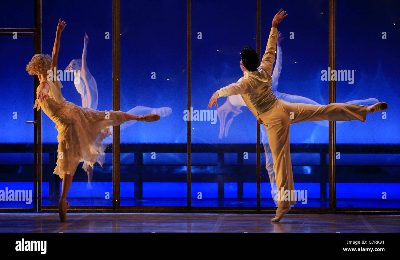 Javier Torres and Dreda Blow perform the 'Heavenly Space Pas de Deux' from the Northern Ballet's production of The Great Gatsby during a technical rehearsal at Sadlers Wells Theatre, London. Stock Photo