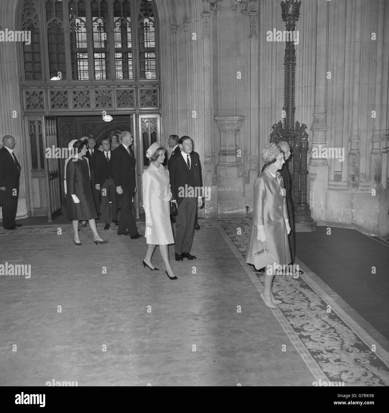 Princess Alexander and her husband Angus Ogilvy pictured arriving at Westminster Hall, London, to attend a ceremony marking the 700th anniversary of Simon de Montfort's Parliament, the first to which representatives of the towns were summoned. The ceremony took the form of presentation of addresses to the Queen by both Houses of Parliament. Stock Photo