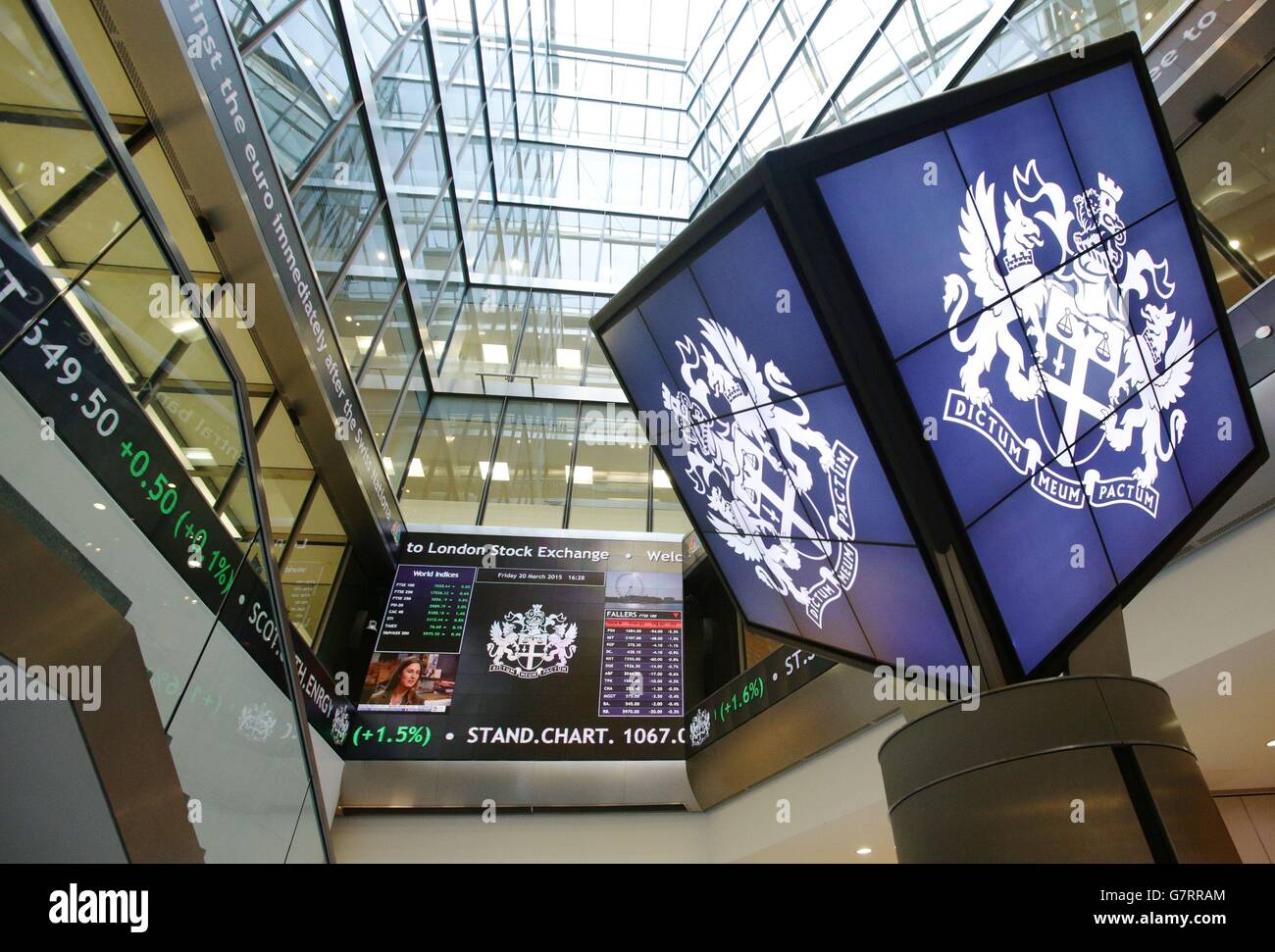 An information screen displaying the FTSE 100, which has risen above