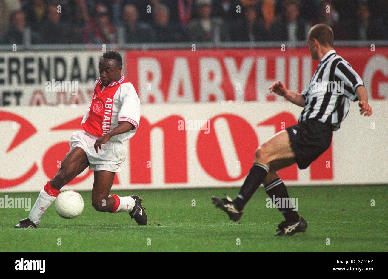Tijani Babangida, Ajax chase for the ball with Gianluca Pessotto, Juventus Stock Photo