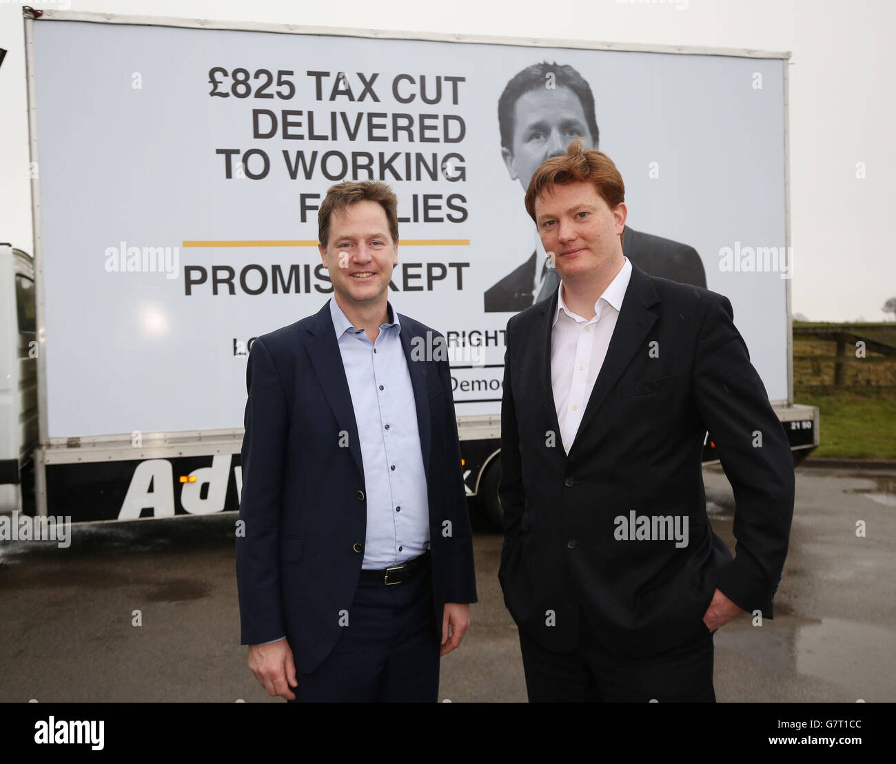 Liberal Democrat leader Nick Clegg and Chief Secretary of the Treasury Danny Alexander during the unveiling of a Liberal Democrat election poster in Hyde, Cheshire. Stock Photo