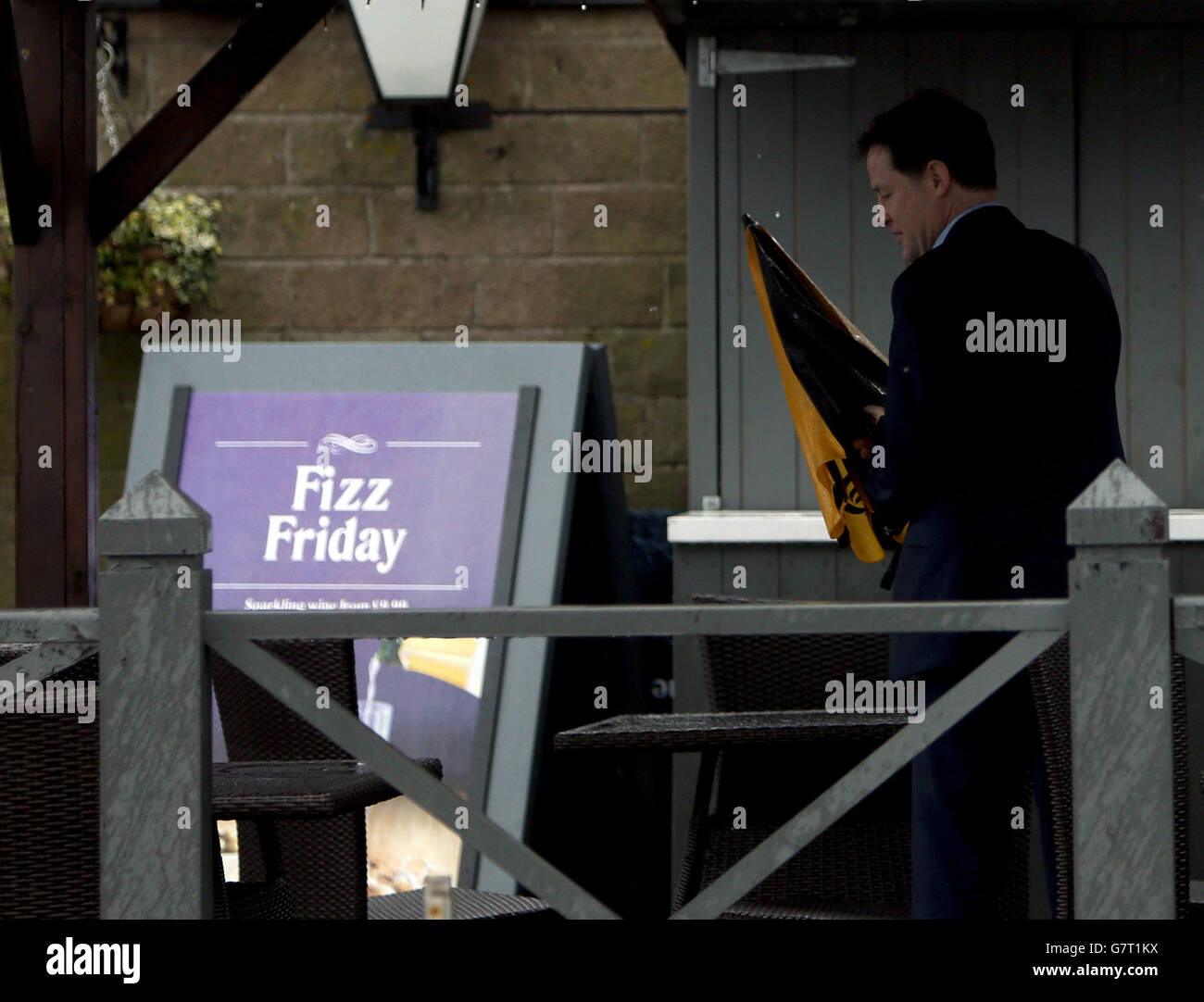 Liberal Democrat leader Nick Clegg arrives to unveil a Liberal Democrat election poster in Hyde, Cheshire. Stock Photo
