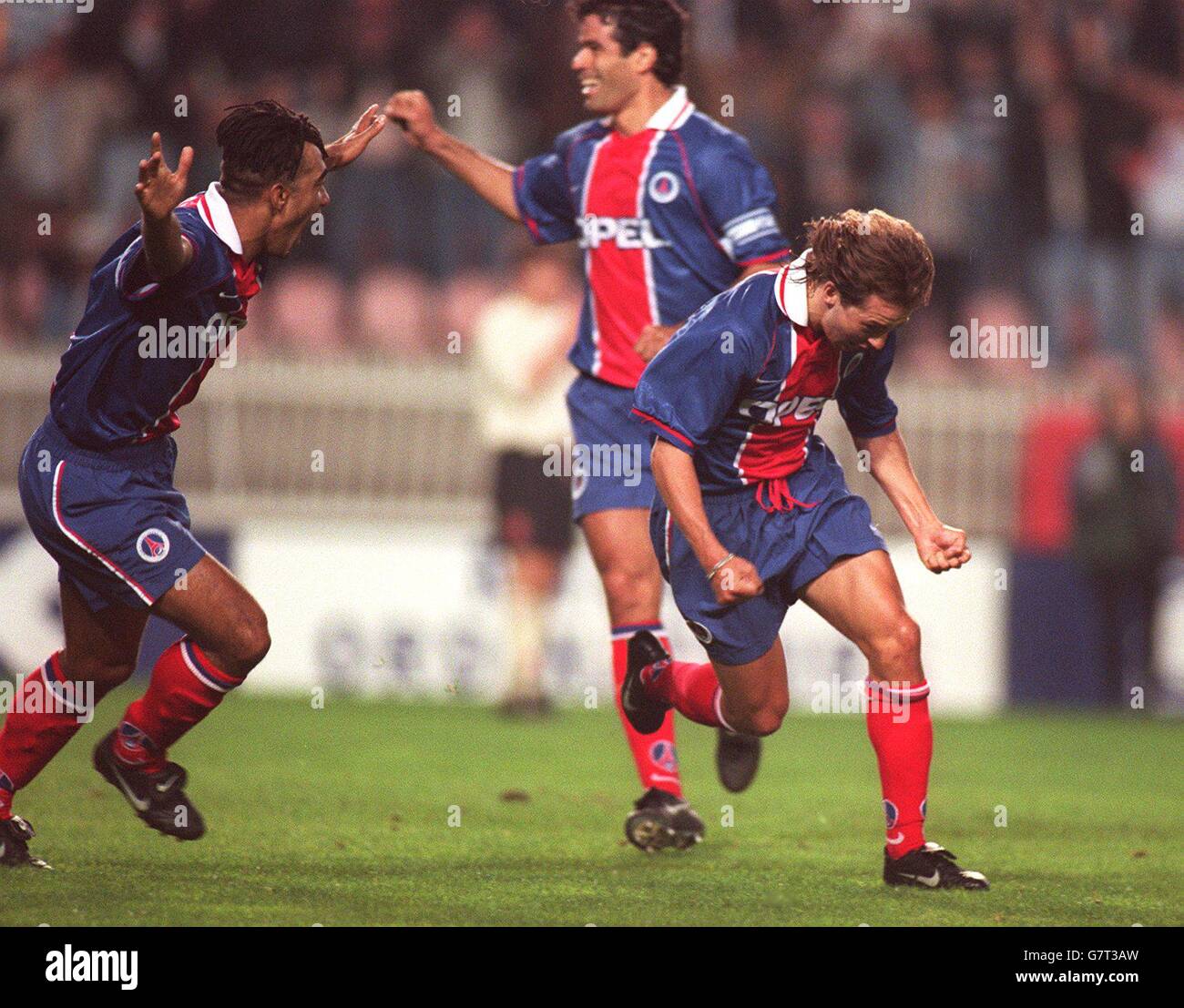 Benoit Cauet, Paris St Germain celebrates with Patrice Loko after their 3rd goal Stock Photo
