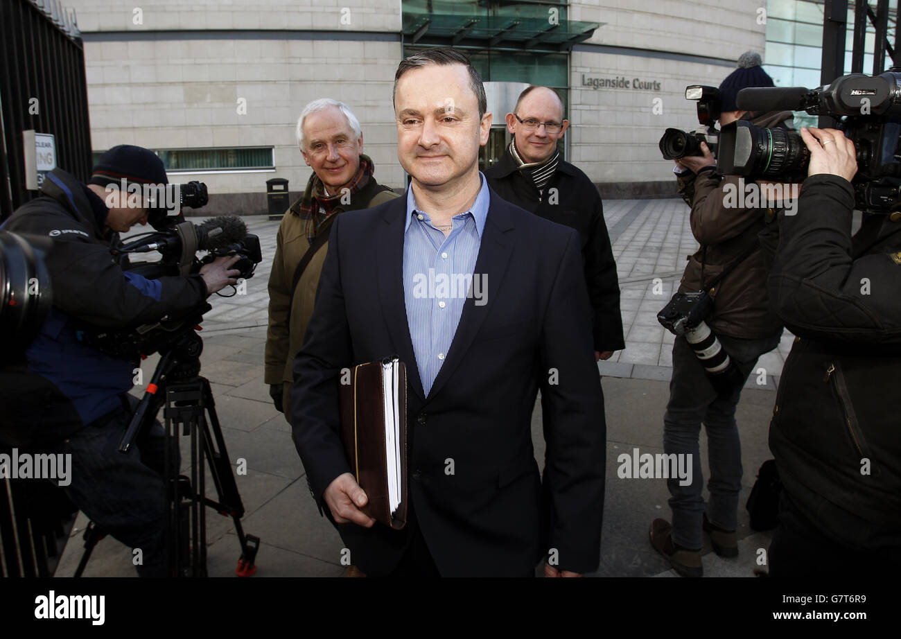 Gay rights activist Gareth Lee, (centre), leaves Belfast County Court where Northern Ireland's Equality Commission is supporting a legal action against family-run Christian bakery, Ashers Bakery, on behalf of the activist , whose order of a cake with an image of Sesame Street puppets Bert and Ernie below the motto 'Support Gay Marriage' was declined. Stock Photo