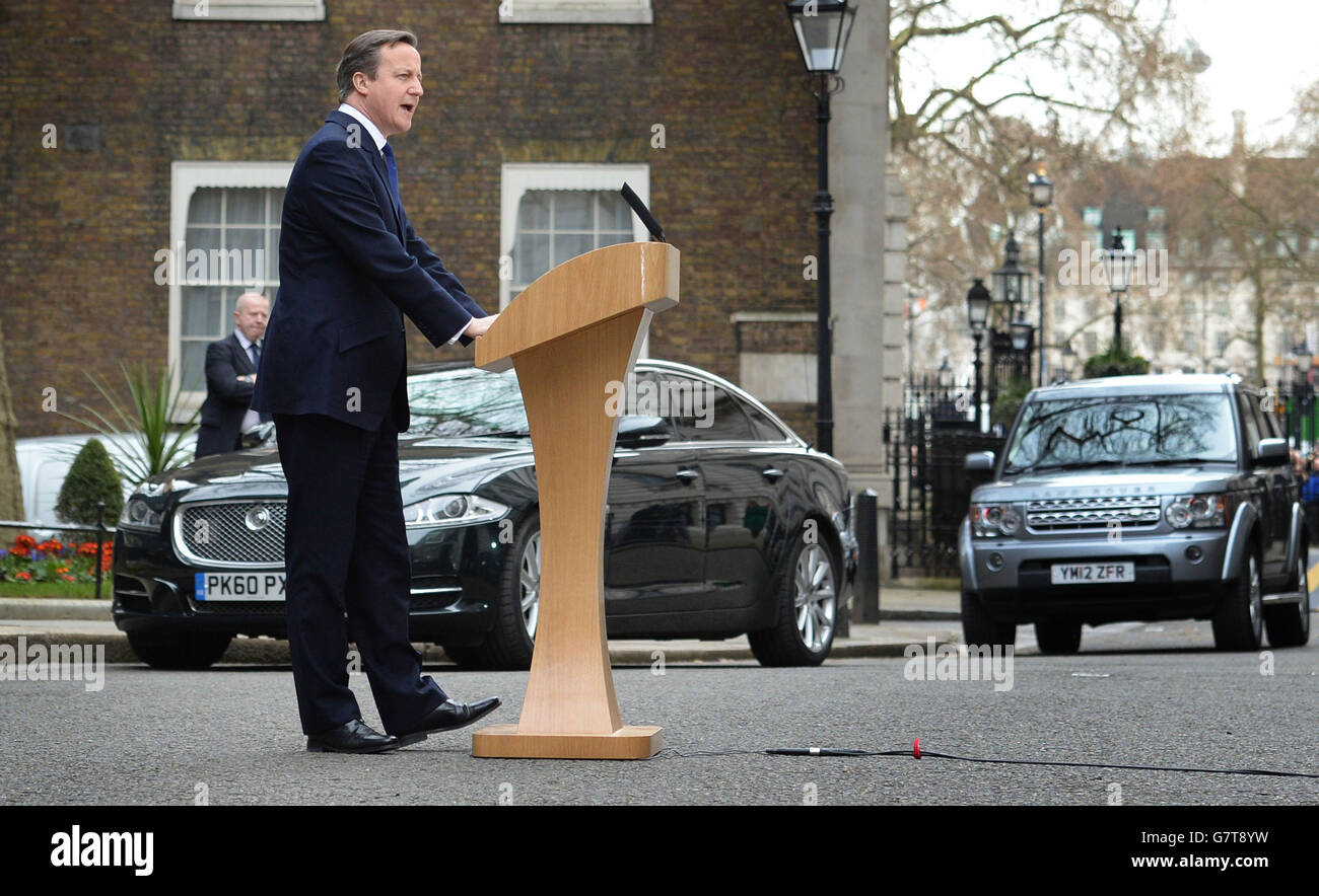 Prime Minister David Cameron speaks to the waiting media outside 10 Downing Street, London, after returning from a private audience with Queen Elizabeth II at Buckingham Palace, as one of the most closely-contested general elections for decades formally gets under way today. Stock Photo