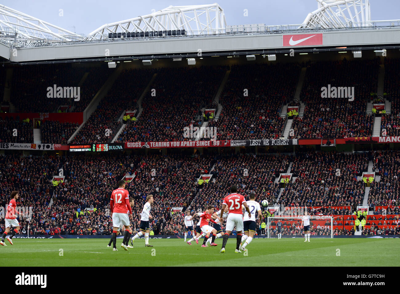 Soccer - Barclays Premier League - Manchester United v Tottenham Hotspur - Old Trafford. General view of the action as fans watch from the stands Stock Photo