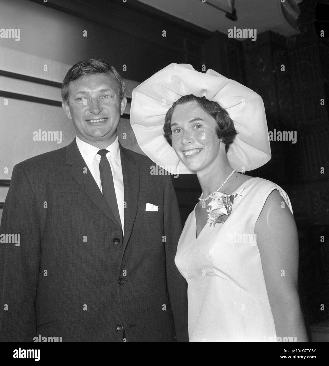 Former Australian cricket captain Richie Benaud with former Miss Daphne Surfleet after their wedding at Caxton Hall, Westminster, London. Stock Photo