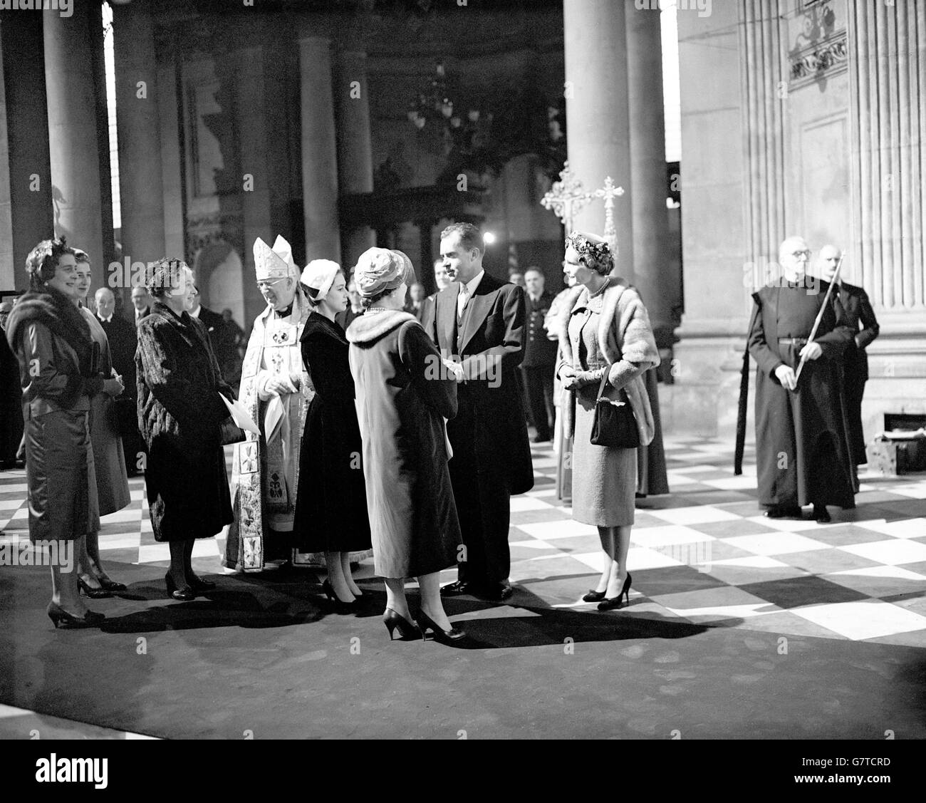 The Queen Mother and Princess Margaret talking with US Vice-President Richard Nixon and Mrs. Nixon after the dedication of the American Memorial Chapel in St. Paul's Cathedral, London. At left, the Princess Royal, the Duchess of Kent, and Princess Alexandra of Kent talk with the Archbishop of Canterbury, Dr. Geoffrey Fisher. The Chapel is Britain's tribute to 28,000 members of the American Armed Forces who died in the last war in operations based in this country. Stock Photo