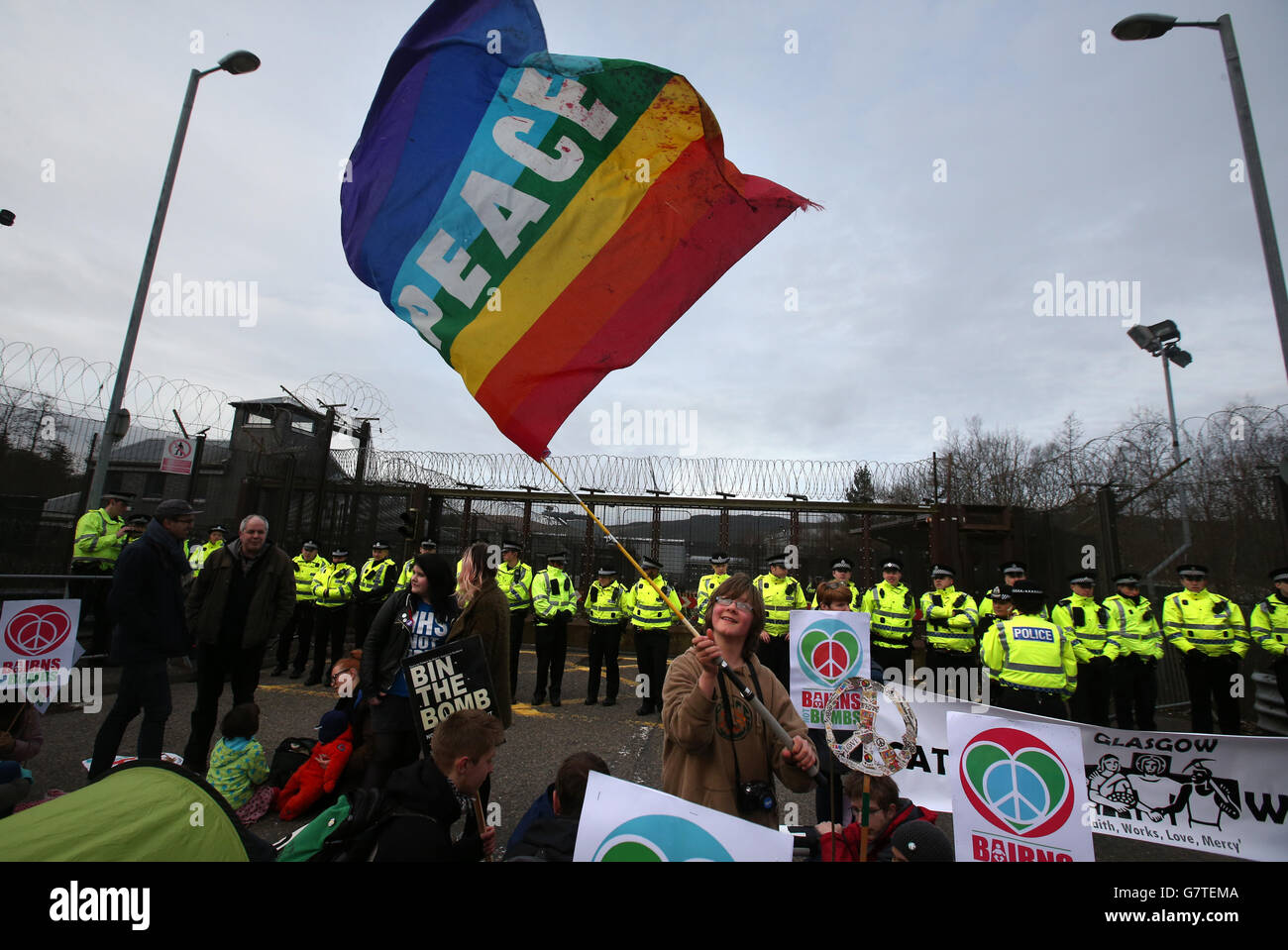 Anti-Trident demonstrators at the entrance at the North Gate at HM Naval Base Clyde, Faslane. Stock Photo