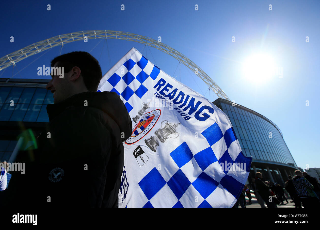 Soccer - FA Cup - Semi Final - Reading v Arsenal - Wembley Stadium. A Reading fan's flag flutters in the wind underneath the Wembley arch as the sun shines Stock Photo