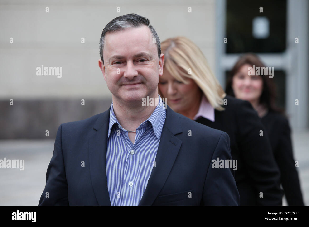 Gay rights activist Gareth Lee leaves Belfast County Court where Northern Ireland's Equality Commission is supporting a legal action against family-run Christian bakery, Ashers Bakery, on behalf of the activist , whose order of a cake with an image of Sesame Street puppets Bert and Ernie below the motto 'Support Gay Marriage' was declined. Stock Photo