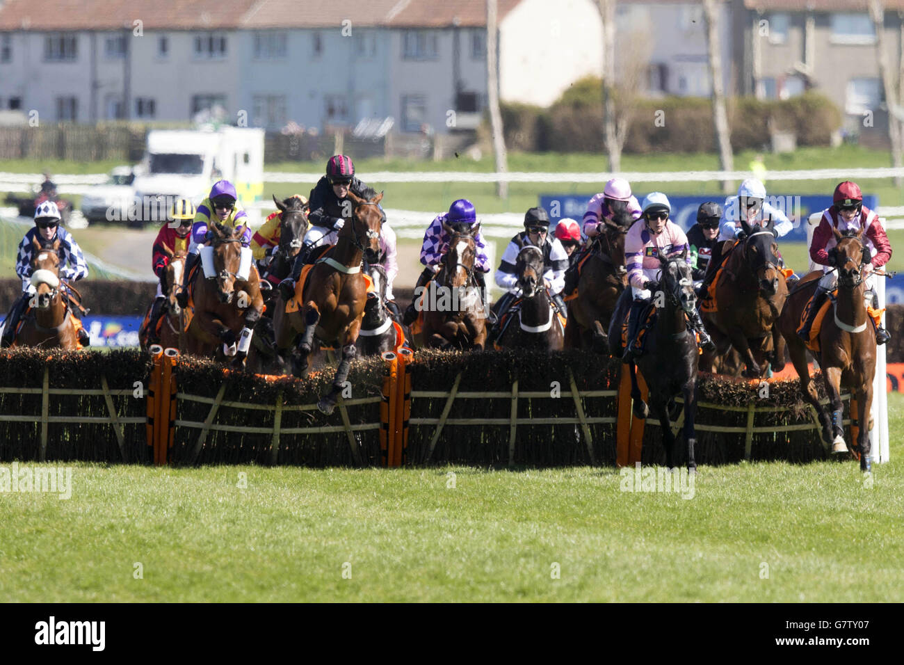 Horse Racing - 2015 Coral Scottish Grand National Festival - Day Two - Ayr Racecourse. Runners and riders during the QTS Scottish Champion Hurdle during the 2015 Coral Scottish Grand National Festival at Ayr Racecourse. Stock Photo