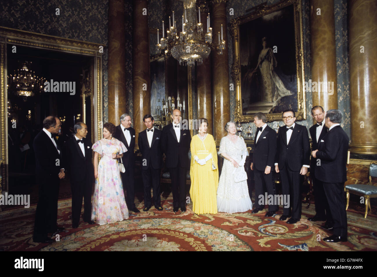 The Queen and members of the Royal Family in the Blue Drawing Room at Buckingham Palace, as they entertained seven world leaders in London for the Downing Street Summit talks. (l-r) Pierre Trudeau (Canada), Takeo Fukuda (Japan), Princess Margaret, James Callaghan, Prince Charles, Giscard d'Estaing (France), Queen Elizabeth II, the Queen Mother, President Carter (USA), Giulio Andreotti (Italy), Prince Philip and Helmut Schmidt (West Germany.) Stock Photo
