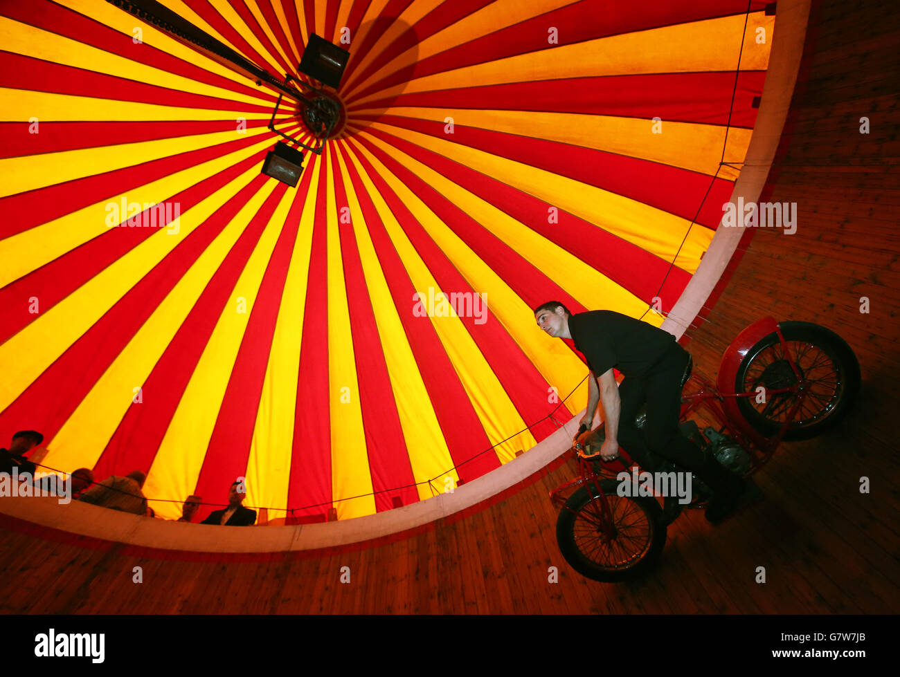 Jake Messham rides the Messham's Wall of Death at the Rua Red arts centre in Tallaght, Dublin, as part of the exhibition A Matter of Life and Death by Stephen Skrynka which celebrates Ireland's famed Wall of Death, as immortalised in the film Eat The Peach. Stock Photo