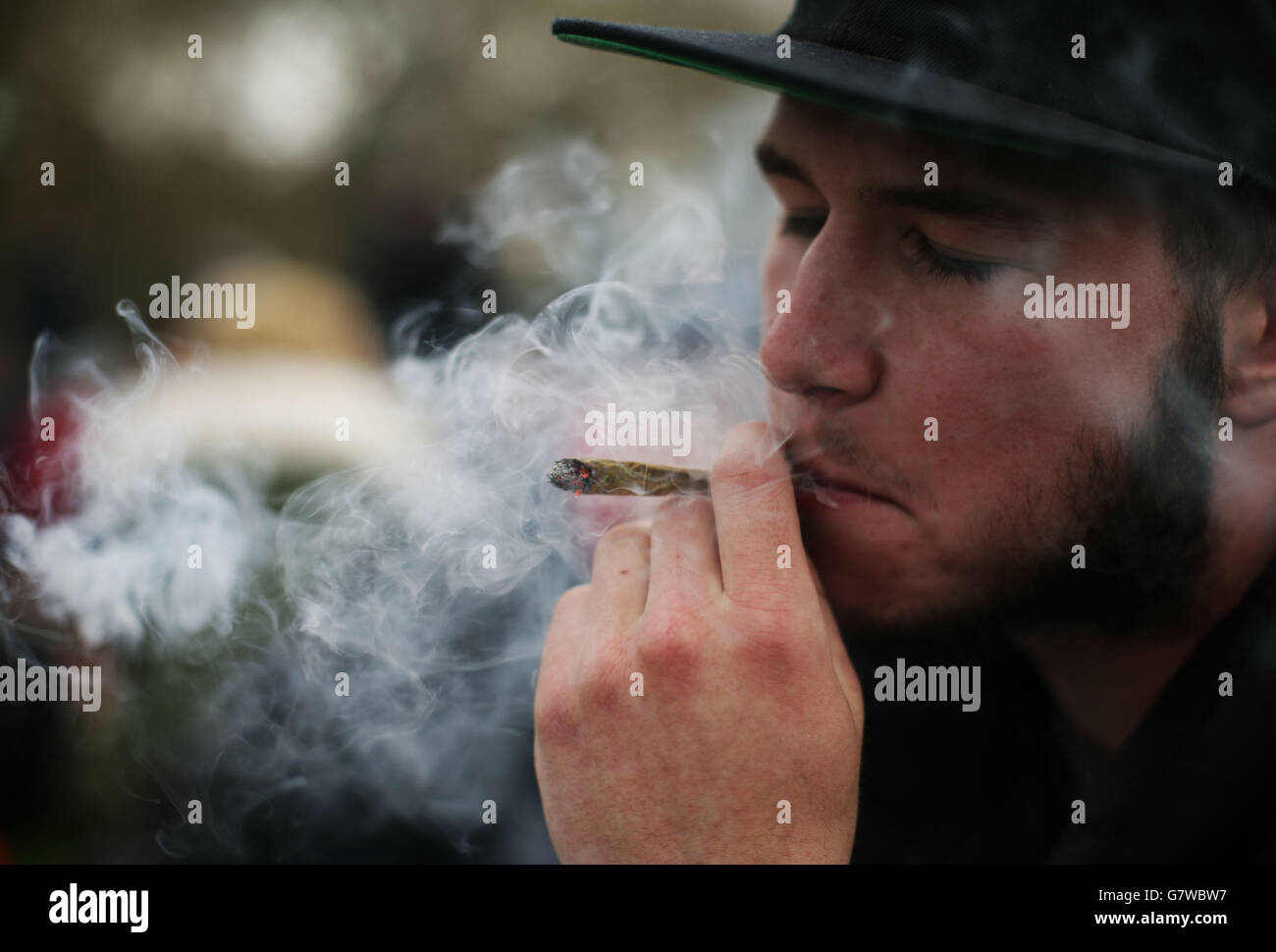 A man smoking during a '420 Celebration' procannabis event organised