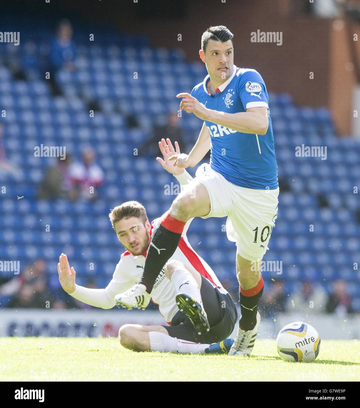 Rangers Haris Vuckic beats Falkirk's Luke Leahy during the Scottish Championship match at Ibrox Stadium, Glasgow. Stock Photo