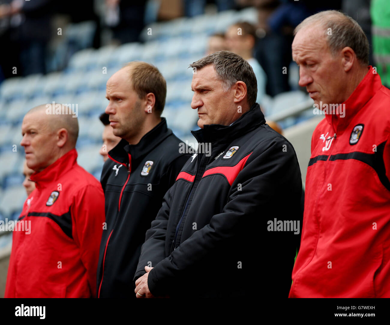 Coventry City manager Tony Mowbray and his staff during the minutes