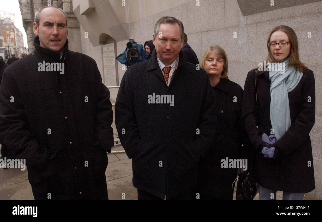 From left: Tom Finnegan, John Finnegan with his wife Sue and daughter Jenny, the family of ex-banker Denis Finnegan outside the Old Bailey, after paranoid schizophrenic John Barrett pleaded guilty to his manslaughter as he cycled through a park. Barrett, 41, pleaded guilty to the manslaughter of 50-year-old Mr Finnegan on the grounds of diminished responsibility. Mr Finnegan's brother John said after the hearing that Denis would still be alive today if Barrett had been cared for properly. Stock Photo