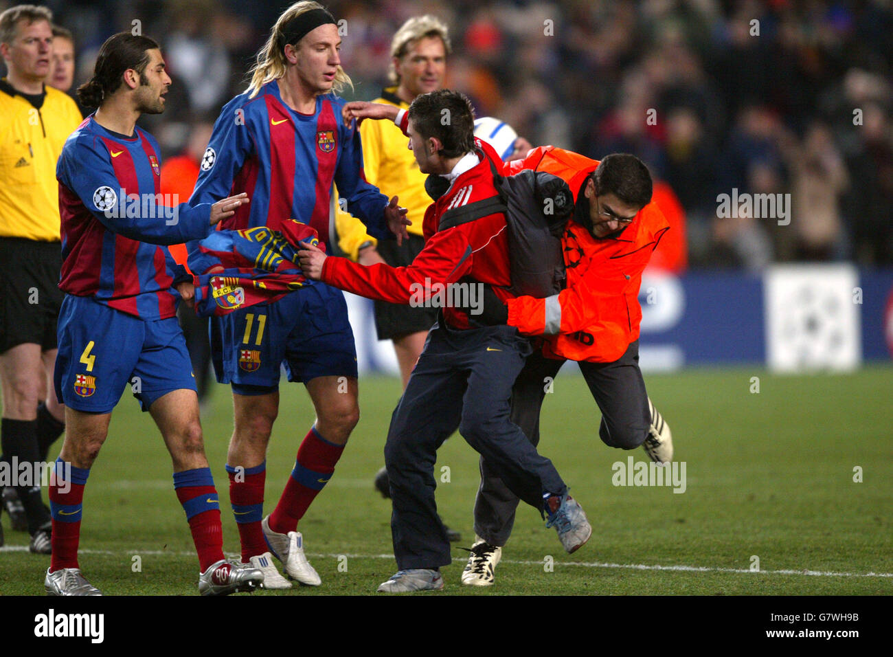 Barcelona's Maxi Lopez pleads to steward to release a supporter Stock Photo