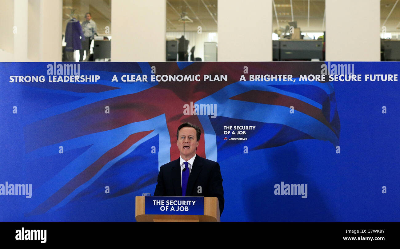 Prime Minister David Cameron delivers a speech at Fujitsu in Solihull, as Mr Cameron warned of more borrowing and taxes if Ed Miliband does a deal with the Scottish National Party to become Prime Minister. Stock Photo