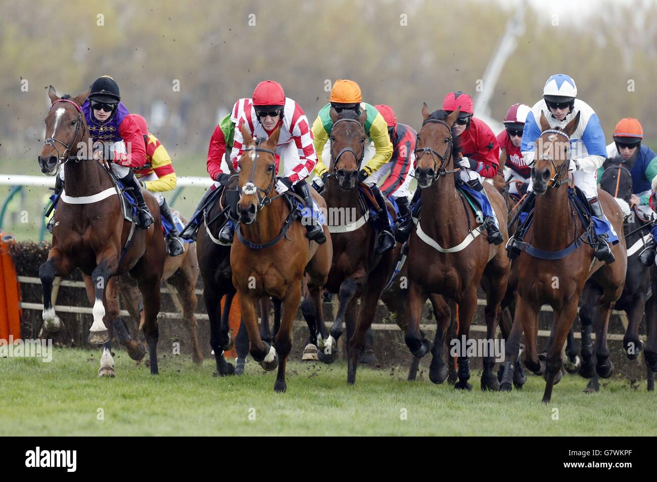Capard King (second left) ridden by jockey Tony McCoy goes on to win the Abbott Risk Consulting Novices' Handicap Hurdle Race (Class 3) during the 2015 Coral Scottish Grand National Festival at Ayr Racecourse. Stock Photo