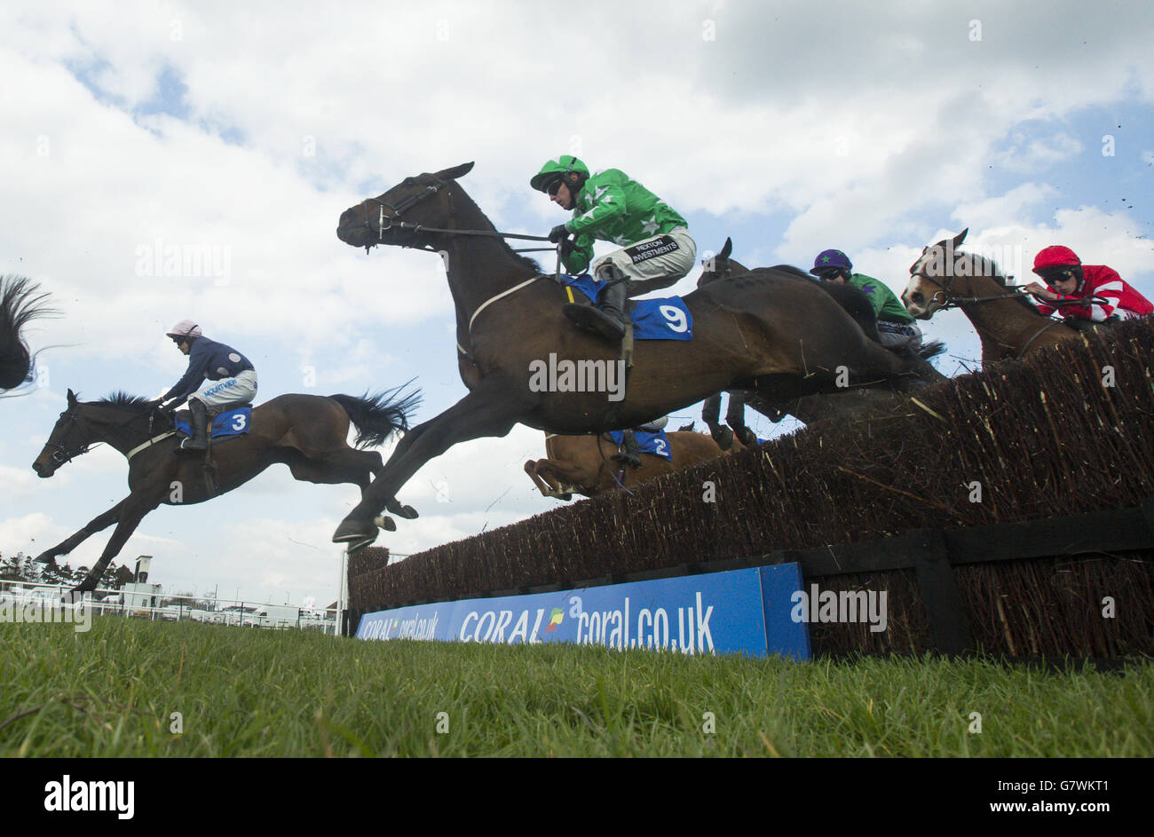 Horse Racing - 2015 Coral Scottish Grand National Festival - Day One - Ayr Racecourse. Runners and riders in The Hillhouse Quarry Handicap Steel Chase during the 2015 Coral Scottish Grand National Festival at Ayr Racecourse. Stock Photo