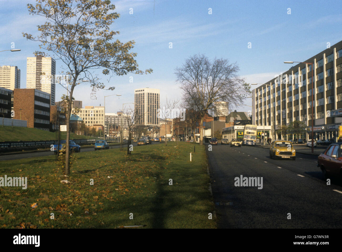 Bristol Street looking towards Birmingham from the south. On right (in background) is the 20-storey circular building, the Rotunda, located in the Bull Ring. Stock Photo