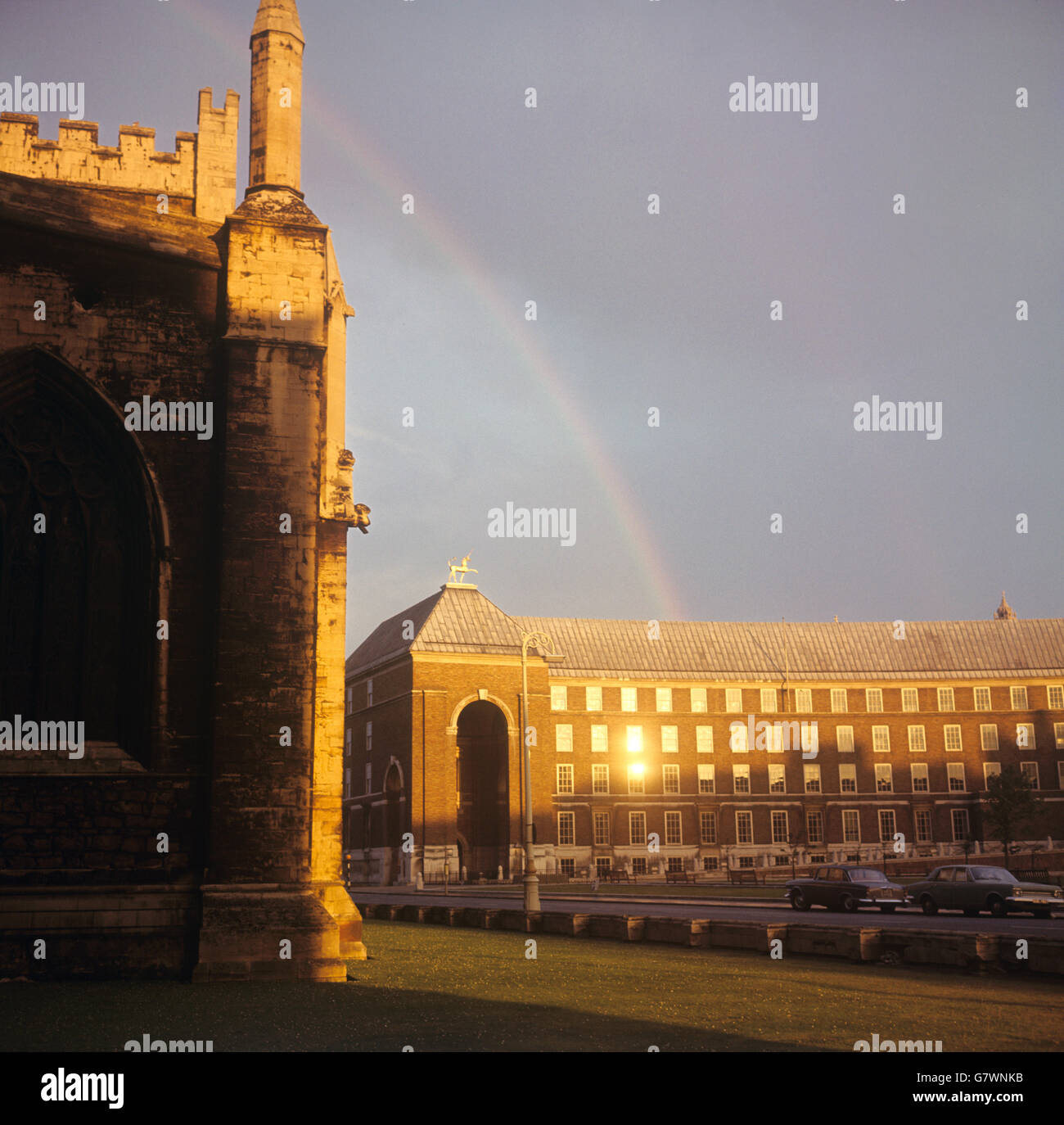 A rainbow arches over Bristol Cathedral and Bristol Town Hall Stock