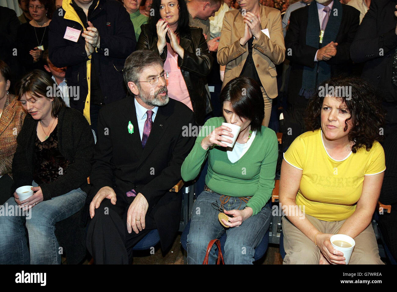 Sinn Fein President Gerry Adams (second left) with the sisiter of murdered Nationalist Robert McCartney. Stock Photo