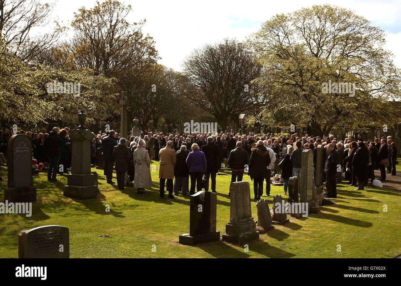 The coffin of an unidentified baby boy sits at his graveside following a funeral service at Seafield Cemetery, Edinburgh, almost two years since he was found dead on a path. Stock Photo