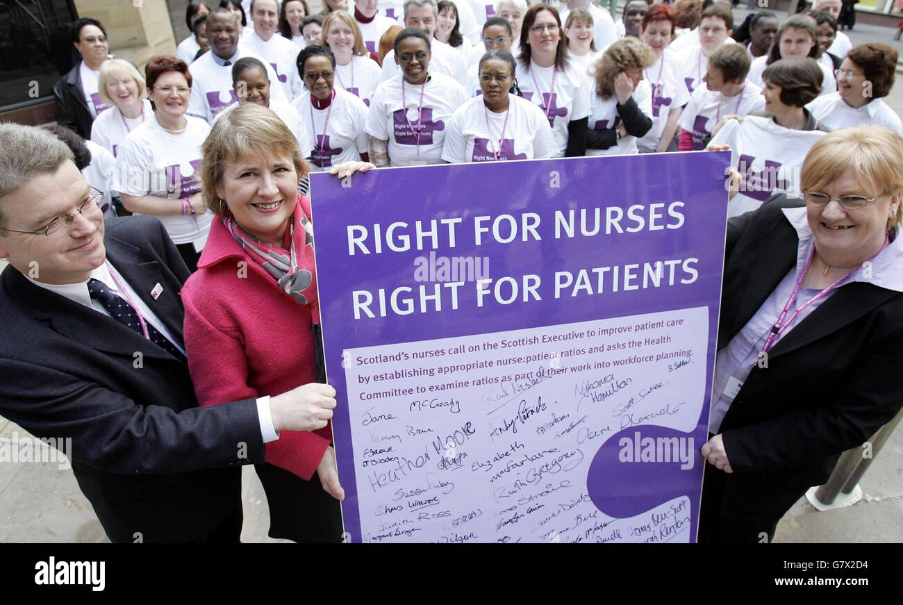 (Left to right:) James Kennedy (Director of Royal College of Nursing in Scotland) with Rossanna Cuningham MSP who received a petition, signed by nurses, from Jane McCready (Board chairwoman of the Royal College of Nursing in Scotland) at the Right Numbers campaign launch, a campaign to increase staffing numbers. Stock Photo