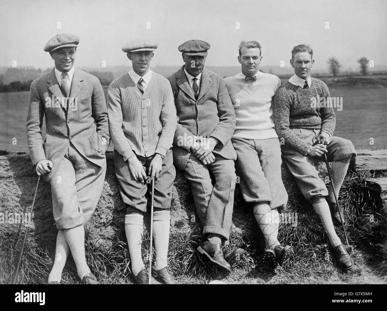 English golf legend James Braid (c) meets up with four American Open entrants during a practice session: (l-r) Robert Gardner, Francis Ouimet, Braid, Jess Sweetser, Harrison Johnston Stock Photo